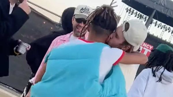 Watch: The Bromance Continues as Justin Bieber and Jaden Smith Catch Up with a Kiss at Coachella